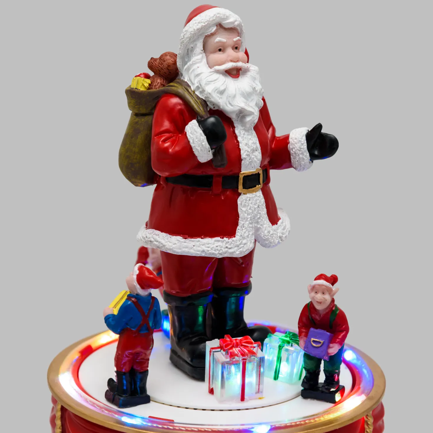 Babbo Natale con Elfi in movimento rotatorio, h 19 cm, musiche natalizie