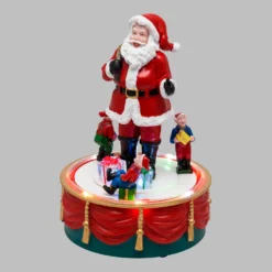 Babbo Natale con Elfi in movimento rotatorio, h 19 cm, musiche natalizie