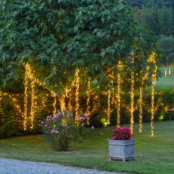 Cascata di luci Connect+ 3 nastri, 600 led bianco caldo, cavo trasparente, prolungabile