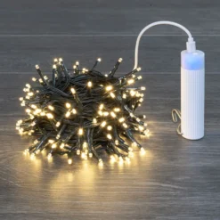 Catena a batteria con power bank 10 m, 200 miniled bianco caldo, cavo verde