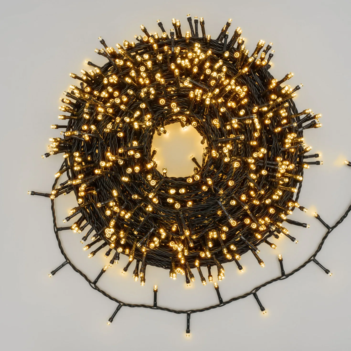 Catena con avvolgitore 60 m, 1500 led bianco caldo, cavo verde
