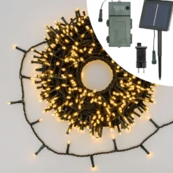 Catena 25 m di luci bianco caldo, pannello solare, trasformatore e portabatterie inclusi