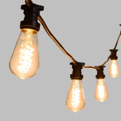 Catena 5 m, 5 lampadine Edison Ø 64 mm di 4 Watt, led a spirale, cavo nero, prolungabile