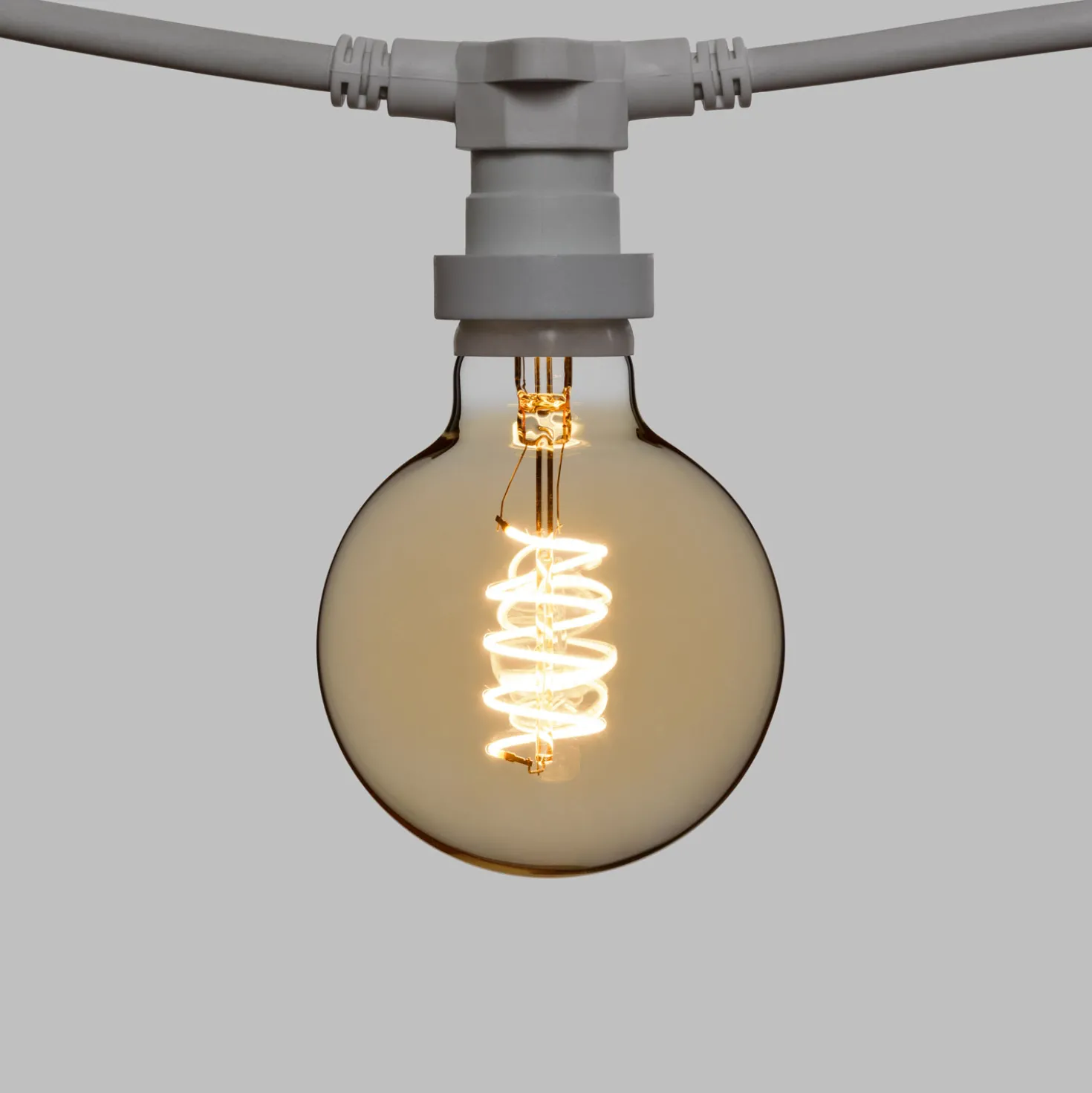 Catena 5 m, 16 lampadine globo Ø 95 mm di 4 Watt, led a spirale, cavo bianco, prolungabile