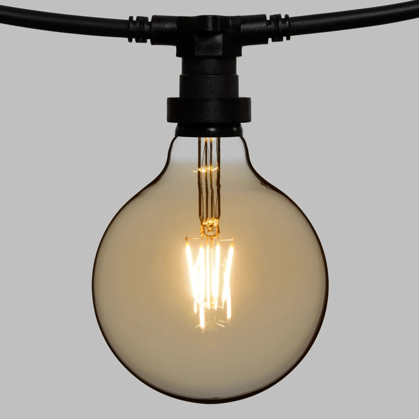 Catena 5 m, 5 lampadine globo Ø 125 mm di 4 Watt led, cavo nero, prolungabile
