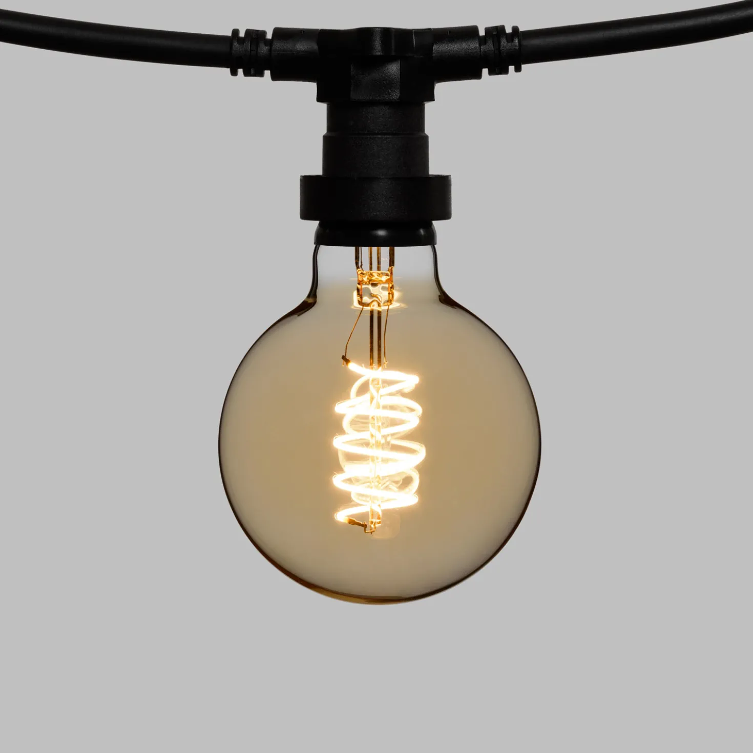 Catena 5 m, 5 lampadine globo Ø 95 mm di 4 Watt, led a spirale, cavo nero, prolungabile