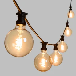 Catena 5 m, 8 lampadine globo Ø 125 mm di 4 Watt, led a spirale, cavo nero, prolungabile