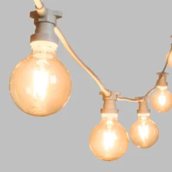Catena 5 m, 5 lampadine led globo Ø 95 mm di 4 watt, dimmerabili, cavo bianco, prolungabile