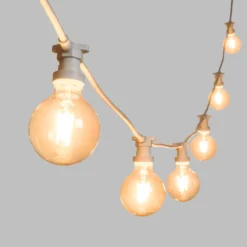 Catena 5 m, 16 lampadine led globo Ø 95 mm di 4 watt, dimmerabili, cavo bianco, prolungabile
