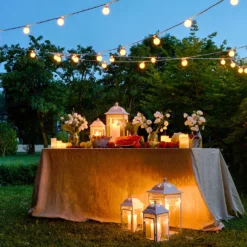 Catena 5 m, 10 sfere bianche Ø 50 mm, led bianco caldo, cavo trasparente, prolungabile