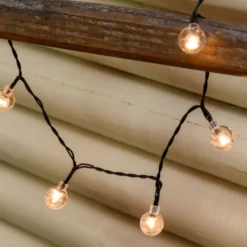 Catena solare 5 m, 50 sfere trasparenti Ø 20 mm, led bianco caldo
