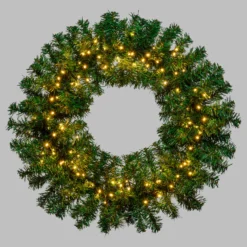 Corona Moena in finto pino a batteria 60 cm, 140 led integrati bianco caldo
