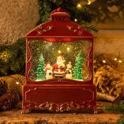 Lanterna natalizia a batteria rosso antico con nevicata glitter, h. 27 cm