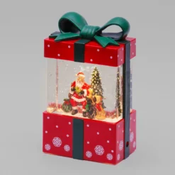 Lanterna Pacco Regalo rosso con glitter scintillanti, h 19 cm, led bianco caldo, musiche natalizie