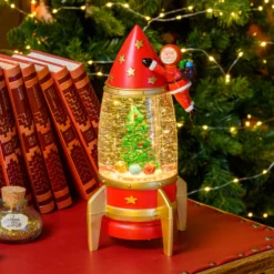 Lanterna Razzo con Babbo Natale astronauta, rosso e oro, h 27,5 cm, led bianco caldo