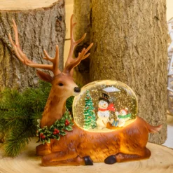 Lanterna Renna con glitter scintillante in movimento, h 26 cm, led bianco caldo