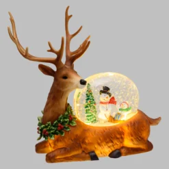 Lanterna Renna con glitter scintillante in movimento, h 26 cm, led bianco caldo