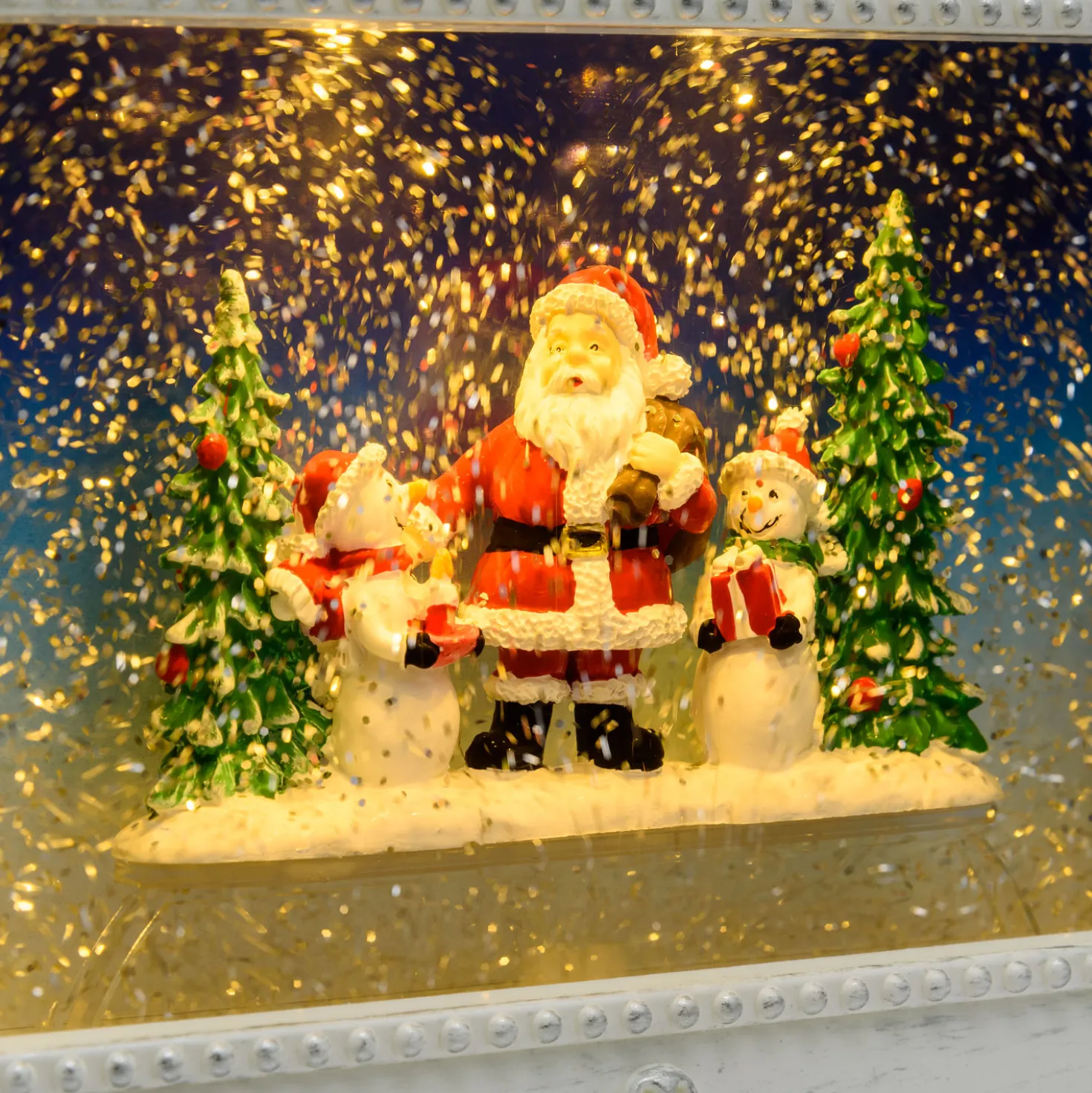 Quadretto luminoso con Babbo Natale e pupazzi di neve, led bianco caldo