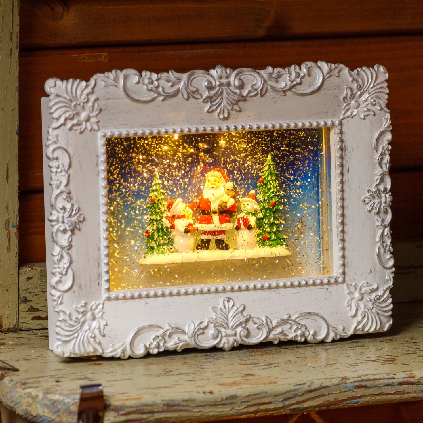 Quadretto luminoso con Babbo Natale e pupazzi di neve, led bianco caldo