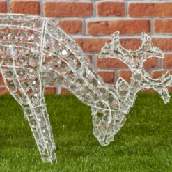 Renna che bruca l'erba, h. 50 cm, led bianco freddo