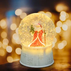Sfera in vetro con base bianca a batteria con nevicata e Babbo Natale, h. 17 cm, led bianco caldo
