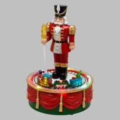 Soldato Schiaccianoci con Trenino Natale in movimento rotatorio, h 19 cm, musiche natalizie