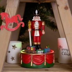 Soldato Schiaccianoci con Trenino Natale in movimento rotatorio, h 19 cm, musiche natalizie