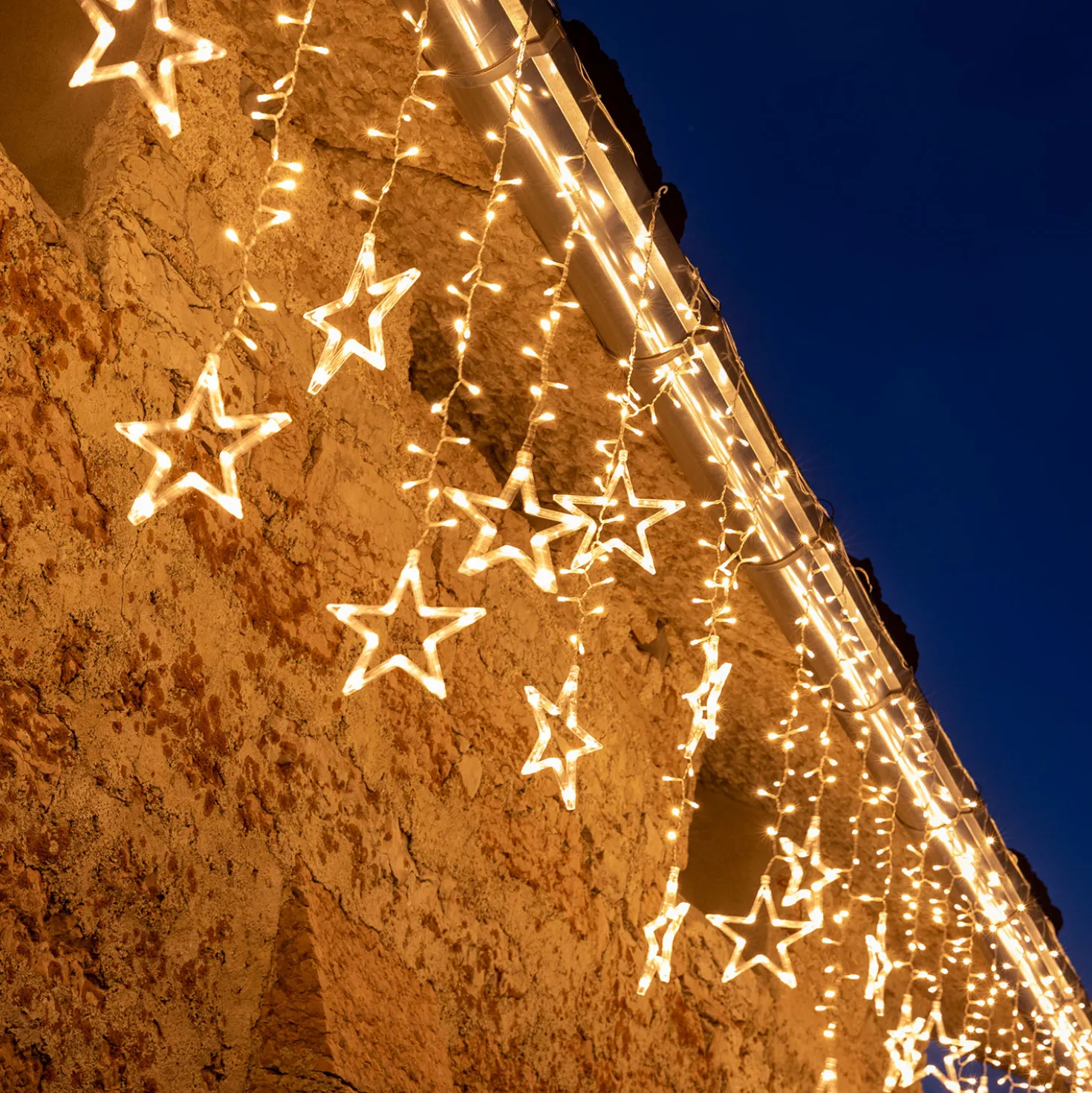 Stalattite decorata con stelle, 5 x h 1,05 m, 620 led bianco caldo