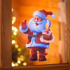 Vetrofania Natalizia a batteria, Babbo Natale con dolce con timer, 25 cm