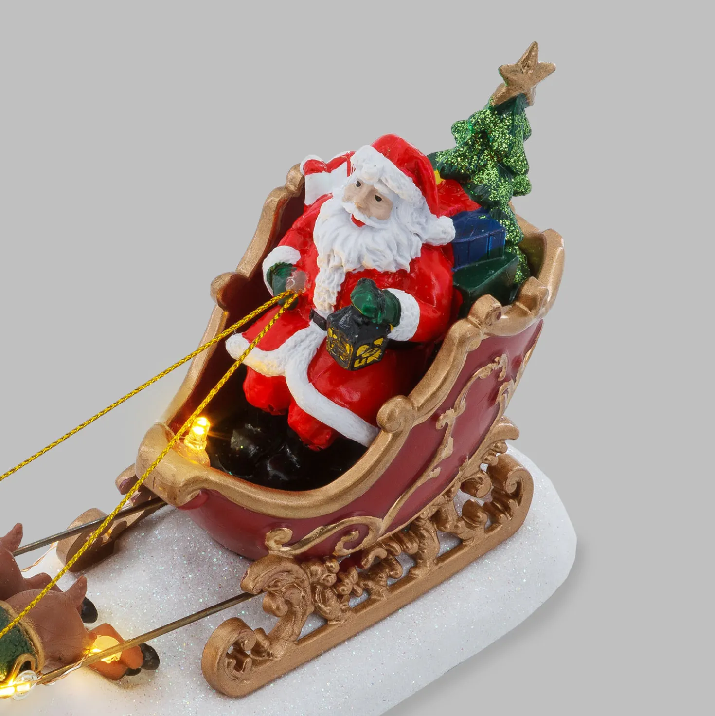 Villaggio di Natale, Babbo Natale su slitta e renne volanti, h 16 cm, led bianco caldo
