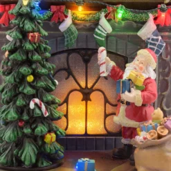 Villaggio di Natale, Caminetto effetto Fiamma con Albero rotante, h 20 cm, musiche natalizie