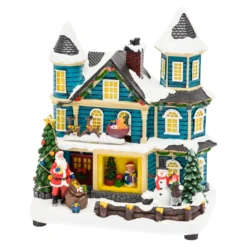 Villaggio di Natale, Casa con scena natalizia, Slitta in movimento e Albero di Natale RGB, h 23 cm, musiche natalizie