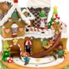 Villaggio di Natale, Casa di Marzapane con personaggi in movimento, h 21 cm, musiche natalizie