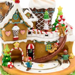 Villaggio di Natale, Casa di Marzapane con personaggi in movimento, h 21 cm, musiche natalizie