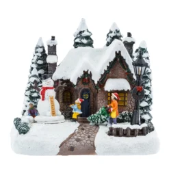 Villaggio di Natale, Casa innevata nel Bosco con Pupazzo di Neve rotante, h 20 cm, musiche natalizie