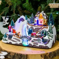 Villaggio di Natale in Poliresina, Trenino in Galleria e Pacchi Regalo rotanti, h 19 cm