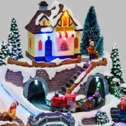 Villaggio di Natale in Poliresina, Trenino in Galleria e Pacchi Regalo rotanti, h 19 cm