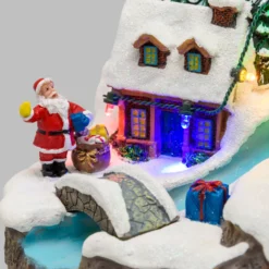 Villaggio di Natale in Poliresina, Ruscello con Ponte e Albero rotante, h 15 cm