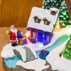 Villaggio di Natale in Poliresina, Ruscello con Ponte e Albero rotante, h 15 cm