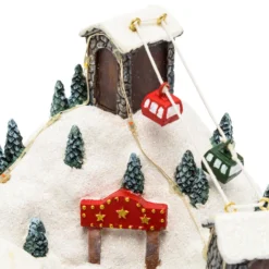 Villaggio di Natale in Poliresina, Paesaggio Montano con Funivia e Pattinatori in movimento, h 16,5 cm