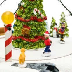 Villaggio di Natale, Paesaggio innevato con pattinatori rotanti in movimento, led multicolor