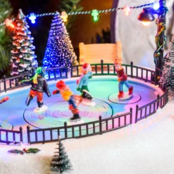 Villaggio di Natale, Pattinatori rotanti in movimento su pista, led multicolor