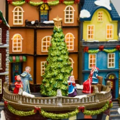 Villaggio di Natale, Stazione con Trenino in movimento e Albero di Natale rotante, h 38 cm, musiche natalizie