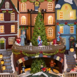Villaggio di Natale, Stazione con Trenino in movimento e Albero di Natale rotante, h 38 cm, musiche natalizie