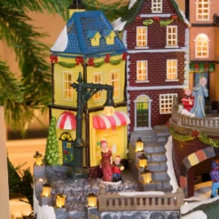 Villaggio di Natale, Stazione con Trenino in movimento e Albero di Natale rotante, h 38 cm, musiche natalizie