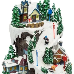 Villaggio Innevato con Sciatori, Trenino in Galleria in movimento in Polyresina, h 38 cm