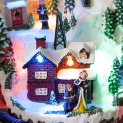 Villaggio innevato di Natale e Trenino con movimento rotante, h 22 cm, musiche natalizie