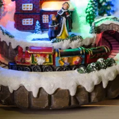 Villaggio innevato di Natale e Trenino con movimento rotante, h 22 cm, musiche natalizie
