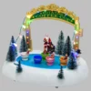 Villagio di Natale con Paesaggio Innevato Luna Park con Tazze rotanti in movimento, h 20 cm, musiche natalizie