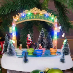 Villagio di Natale con Paesaggio Innevato Luna Park con Tazze rotanti in movimento, h 20 cm, musiche natalizie
